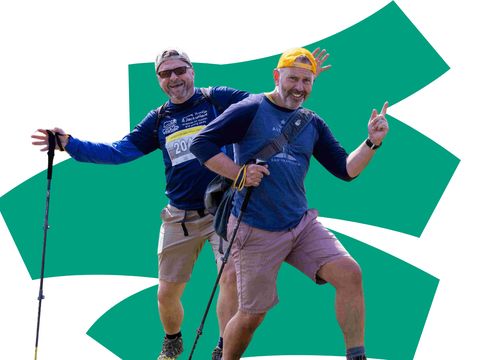 Two men posing on Clarendon Way Walk, colourful background