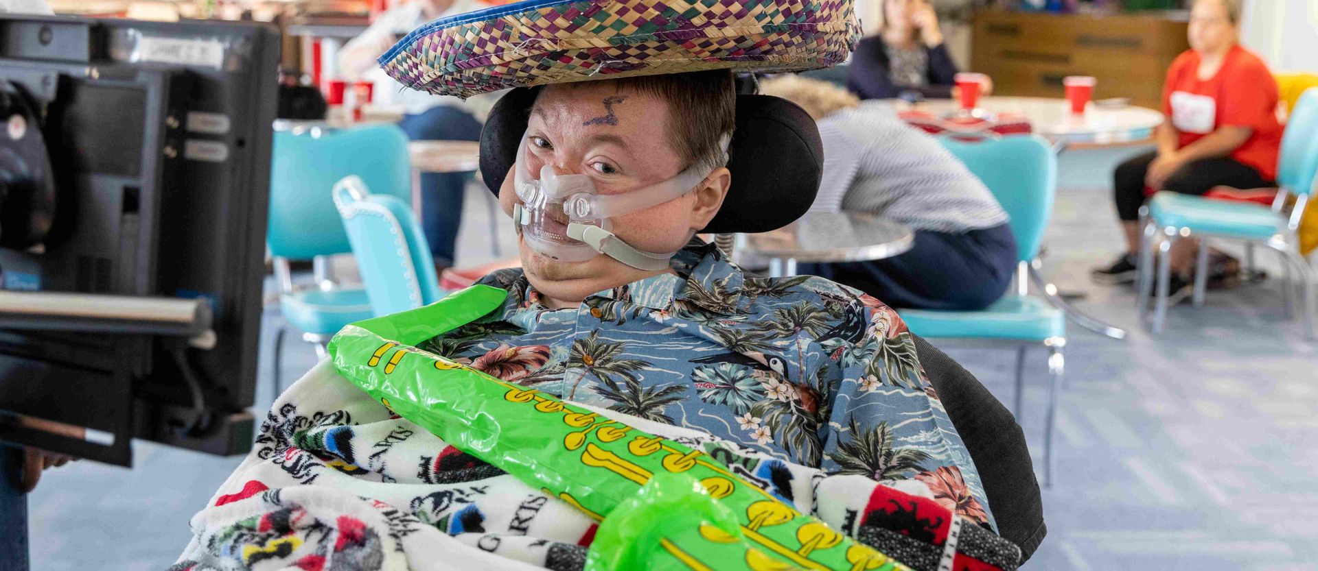Young adult in fancy dress with breathing mask on